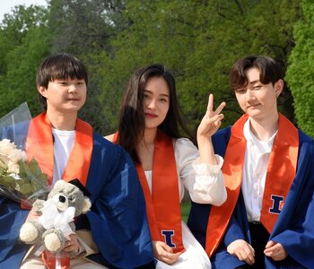 Three students pose at the 2022 SLCL Convocation 